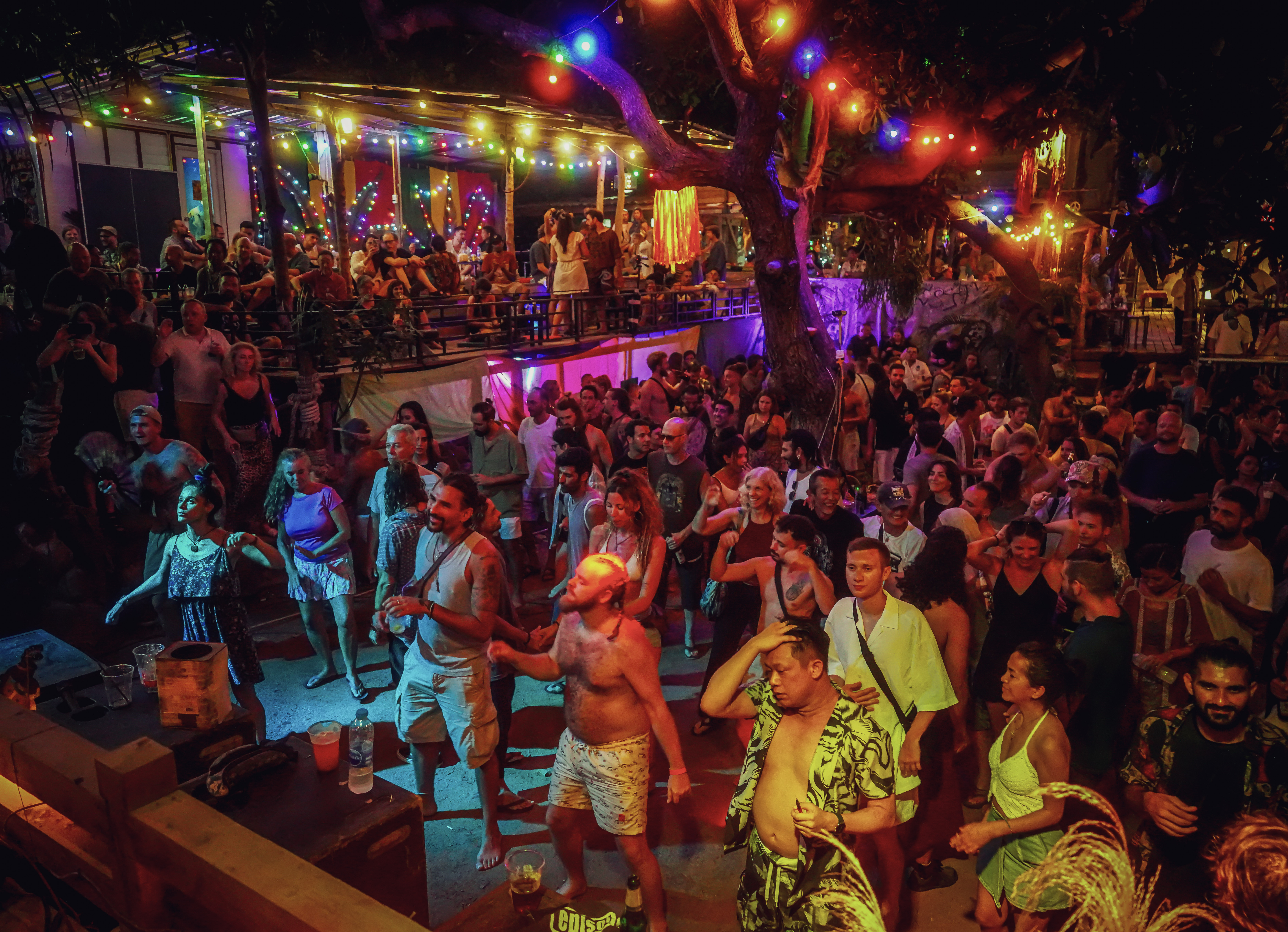 Colorful lights over the crowd dancing at Rasta Home.