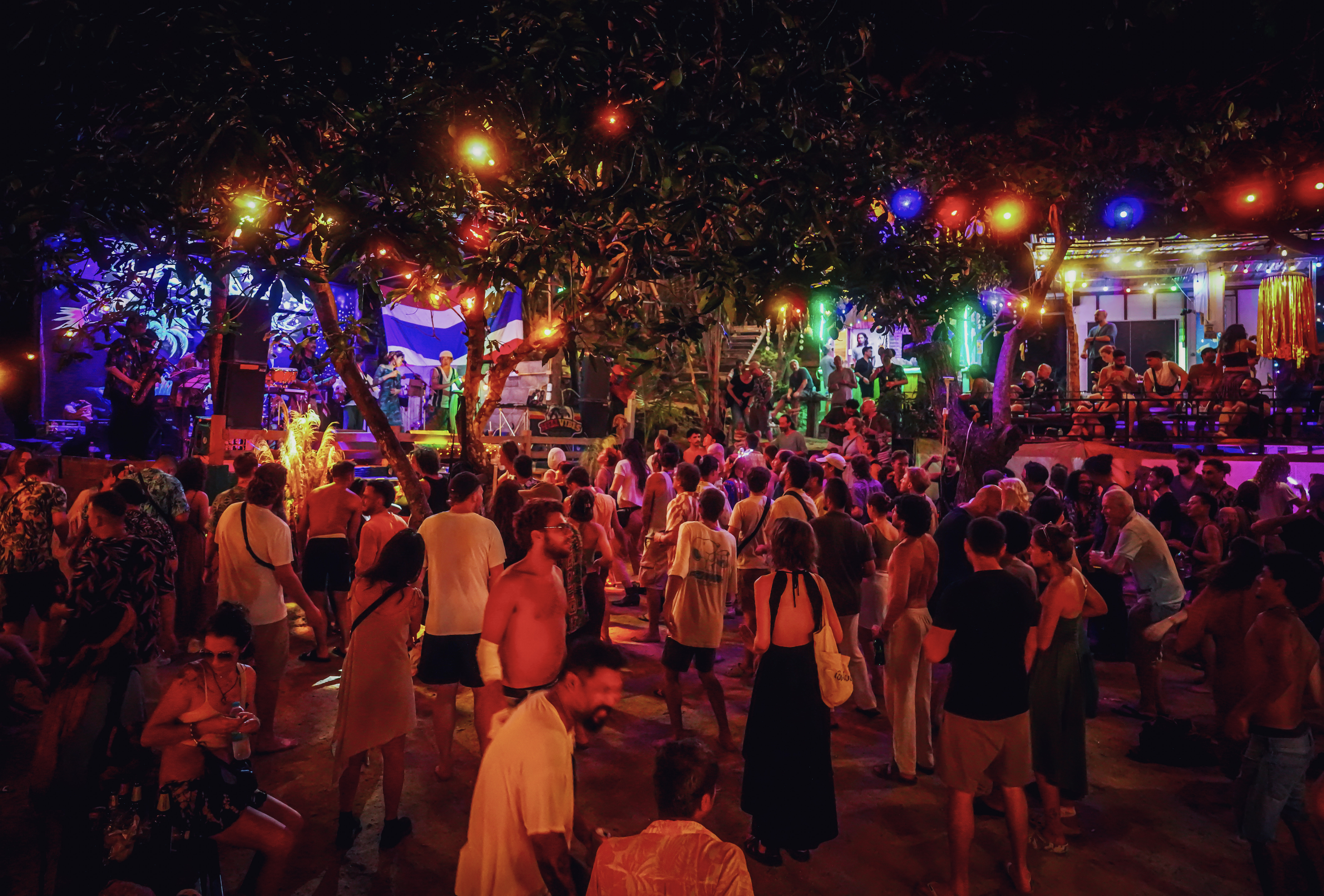 Ground-level view of Rasta Home Bar and stage